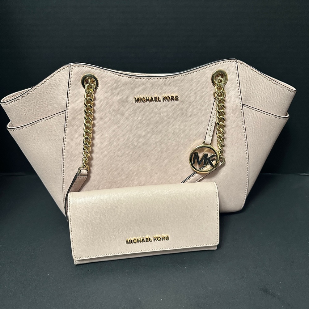Vintage Michael kors pink handbag purse and matching double wallet.